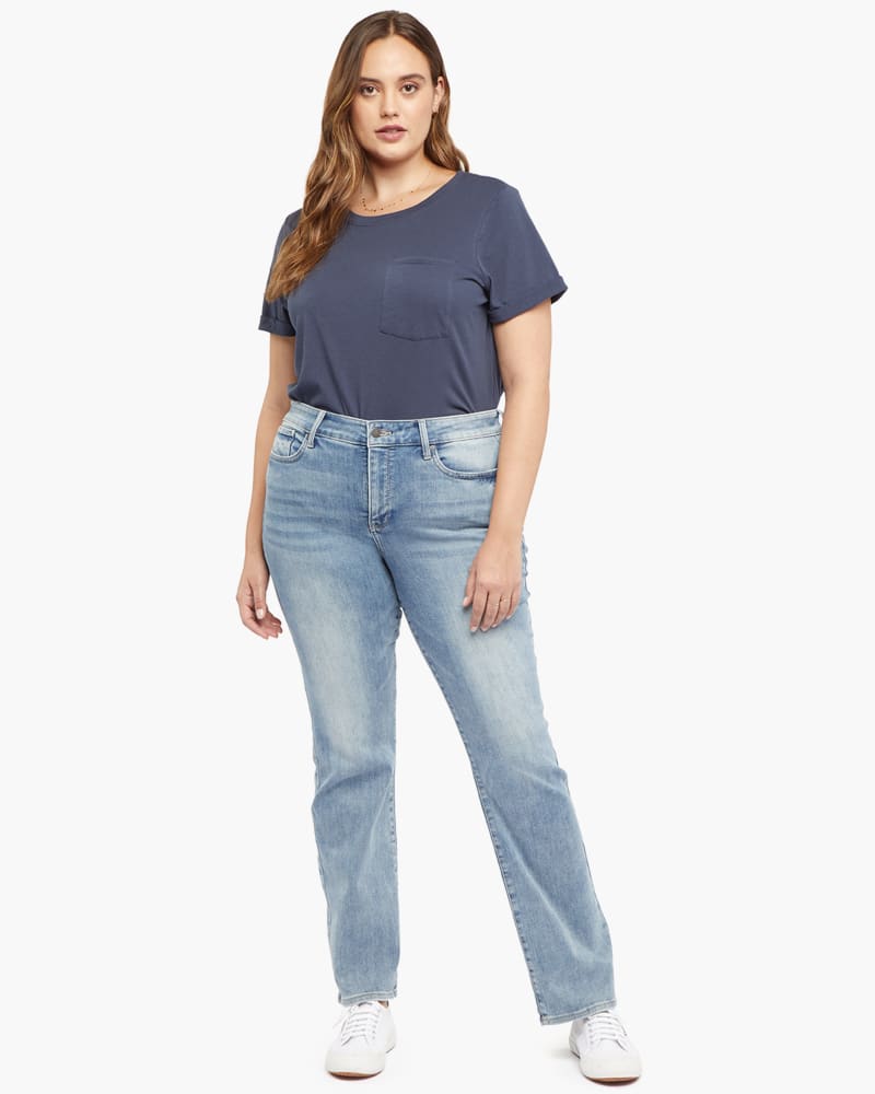 Front of a model wearing a size 14 Marilyn Flare Jean in Seashore by NYDJ. | dia_product_style_image_id:170754